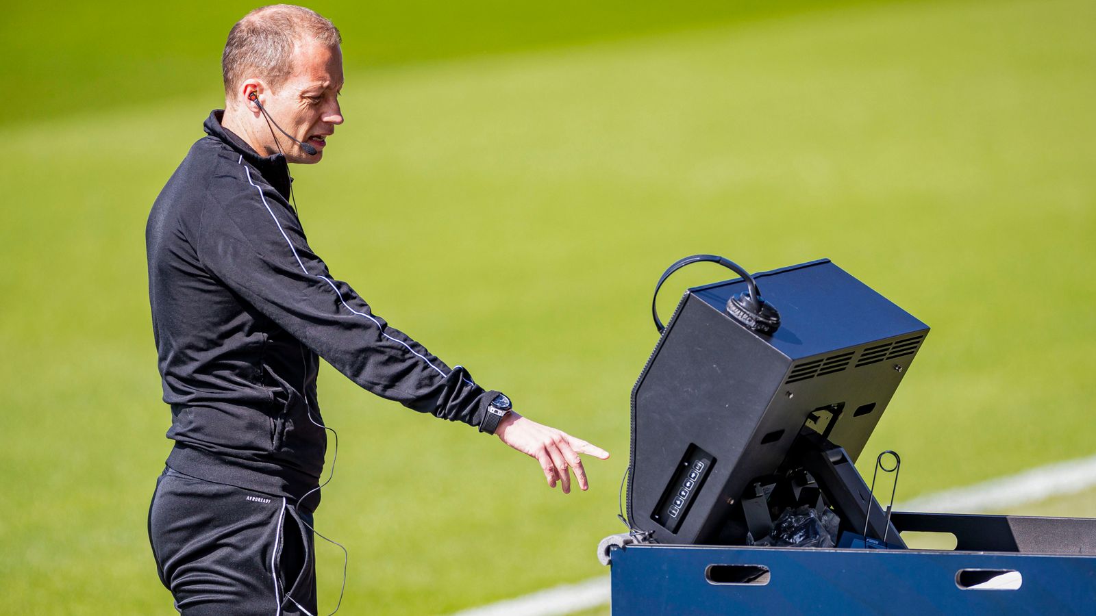 Referee Willie Collum at the VAR screen during a cinch Premiership match