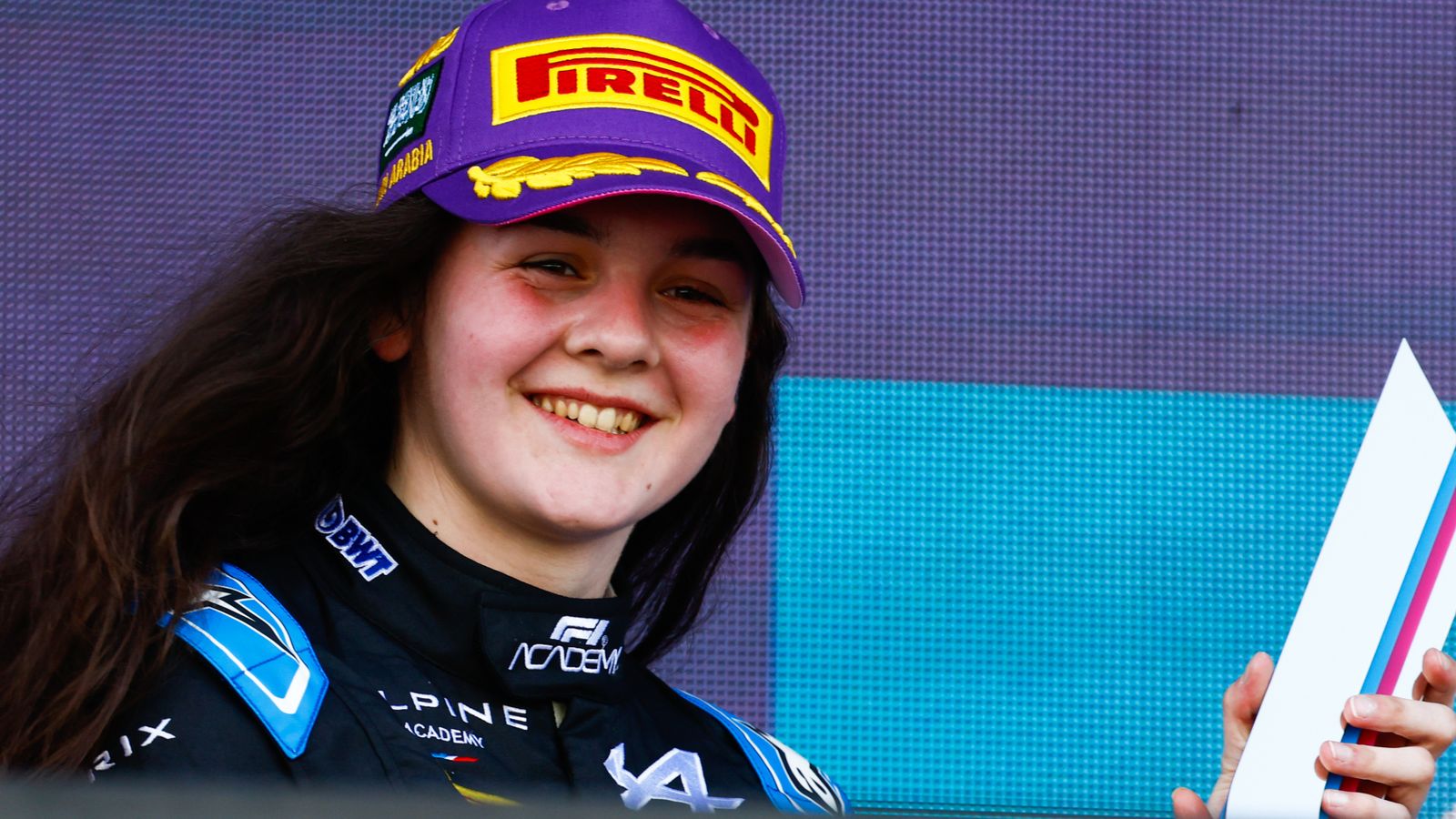 JEDDAH STREET CIRCUIT, SAUDI ARABIA - MARCH 08: Abbi Pulling (GBR, Rodin Motorsport), 2nd position, receives her trophy during the Jeddah at Jeddah Street Circuit on March 08, 2024 in Jeddah Street Circuit, Saudi Arabia. (Photo by Sam Bloxham / LAT Images)